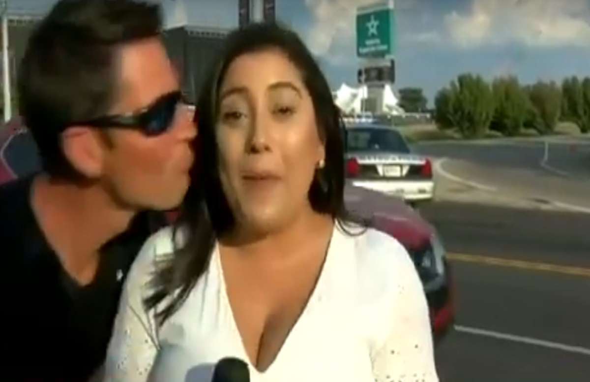 1569748266 man kiss reporter on live