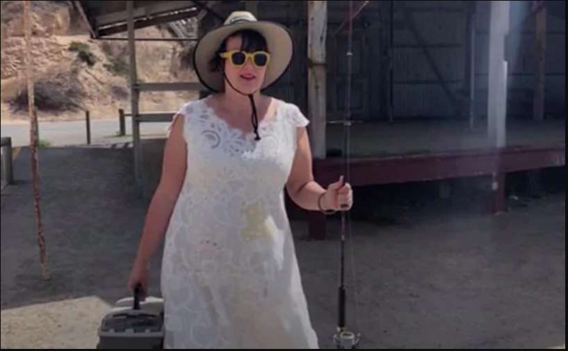 1570098632 woman wears her wedding dress everywhere