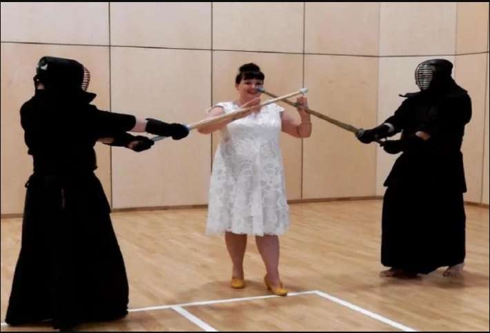 1570098783 woman wears her wedding dress everywhere 1