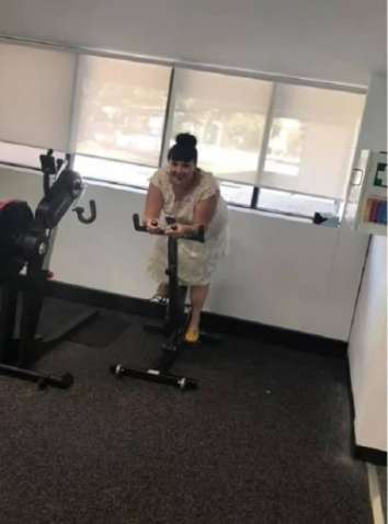 1570098836 woman wears her wedding dress everywhere 2