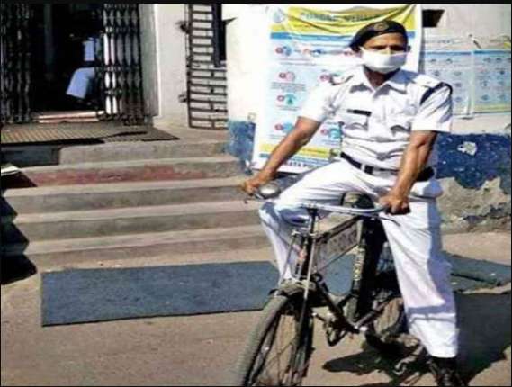 1586249987 police man cycle