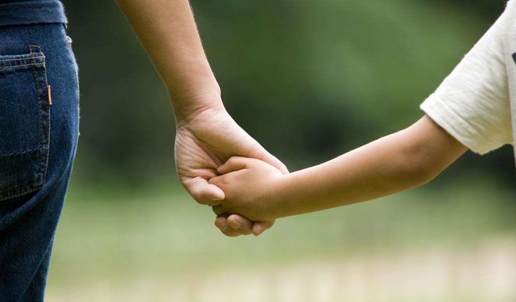 1687593746 parent.discipline.helping adhd kids who hit.article.763b.mother child holding hands.ts 450472405