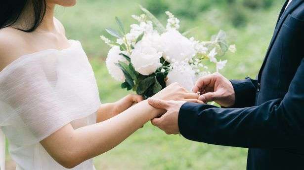 1687859767 0 image of young asian bride and groom
